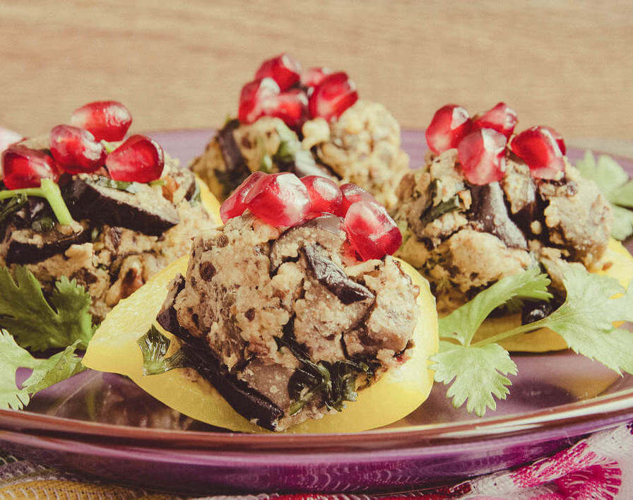 The traditional Georgian appetizer eggplant with walnuts, decorated with pomegranate seeds