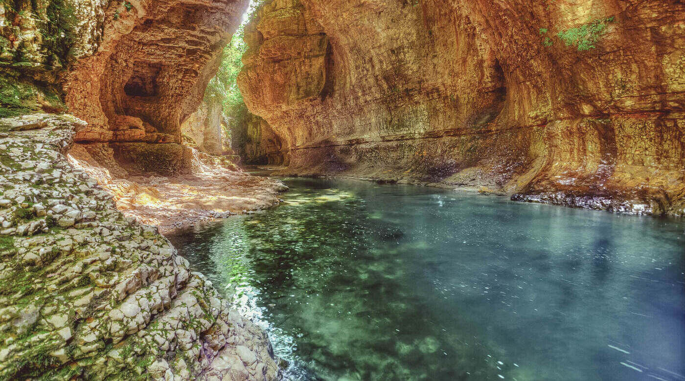 Clear water and rocks in Martvili Canyon in Georgia