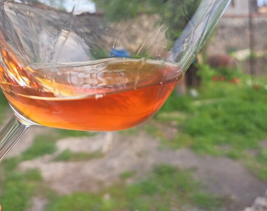 Glass of Georgian orange wine